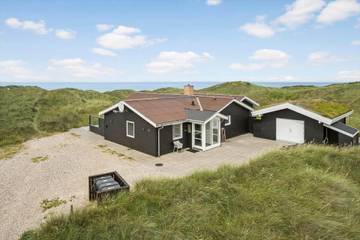 Ferienhaus mit Meerblick für 8 Personen, mit Terrasse und Sauna sowie Whirlpool in Grønhøj Strand
