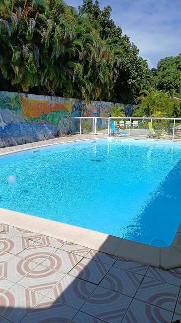 Maison d’hôte pour 4 personnes, avec vue et jardin ainsi que piscine et balcon à Petit-Bourg