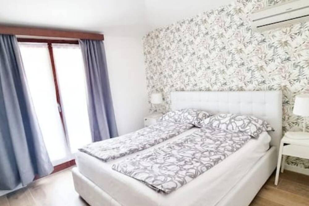 Ganze Wohnung, Design apartment a few steps from the lake in Torbole, Nago-Torbole