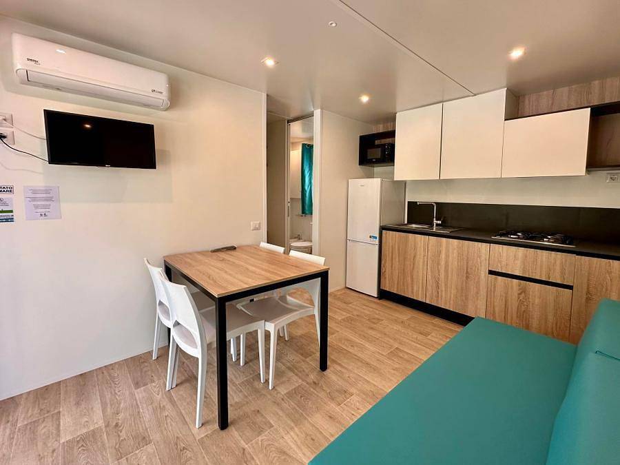 Camping Village Mugello Verde - Casa mobile 2 persone - Casa mobile premium con 2 camere da letto - 2 bagni (2 persone comprese - 2 persone in più possibili con supplemento, contattare il campeggio) in Scarperia e San Piero, Firenze province