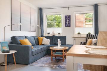 Ferienwohnung für 4 Personen, mit Pool und Sauna sowie Garten und Whirlpool, mit Haustier an der Kieler Bucht