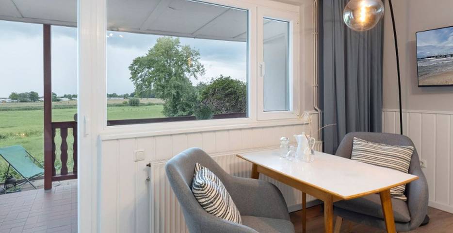 Ferienwohnung für 2 Personen, mit Terrasse und Garten sowie Sauna und Seeblick in Rettin