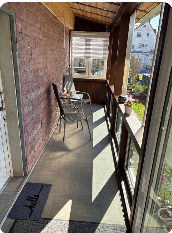Ferienwohnung für 3 Personen, mit Balkon und Terrasse sowie Ausblick in Rüsselsheim