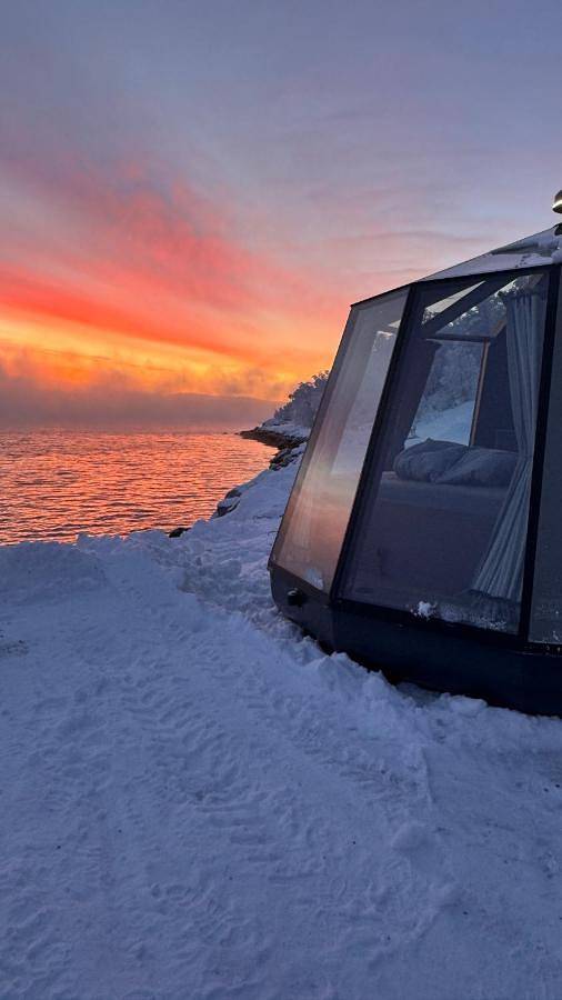 Ferienanlage für 2 Personen, mit Garten und Sauna sowie Ausblick, mit Haustier in Norwegen