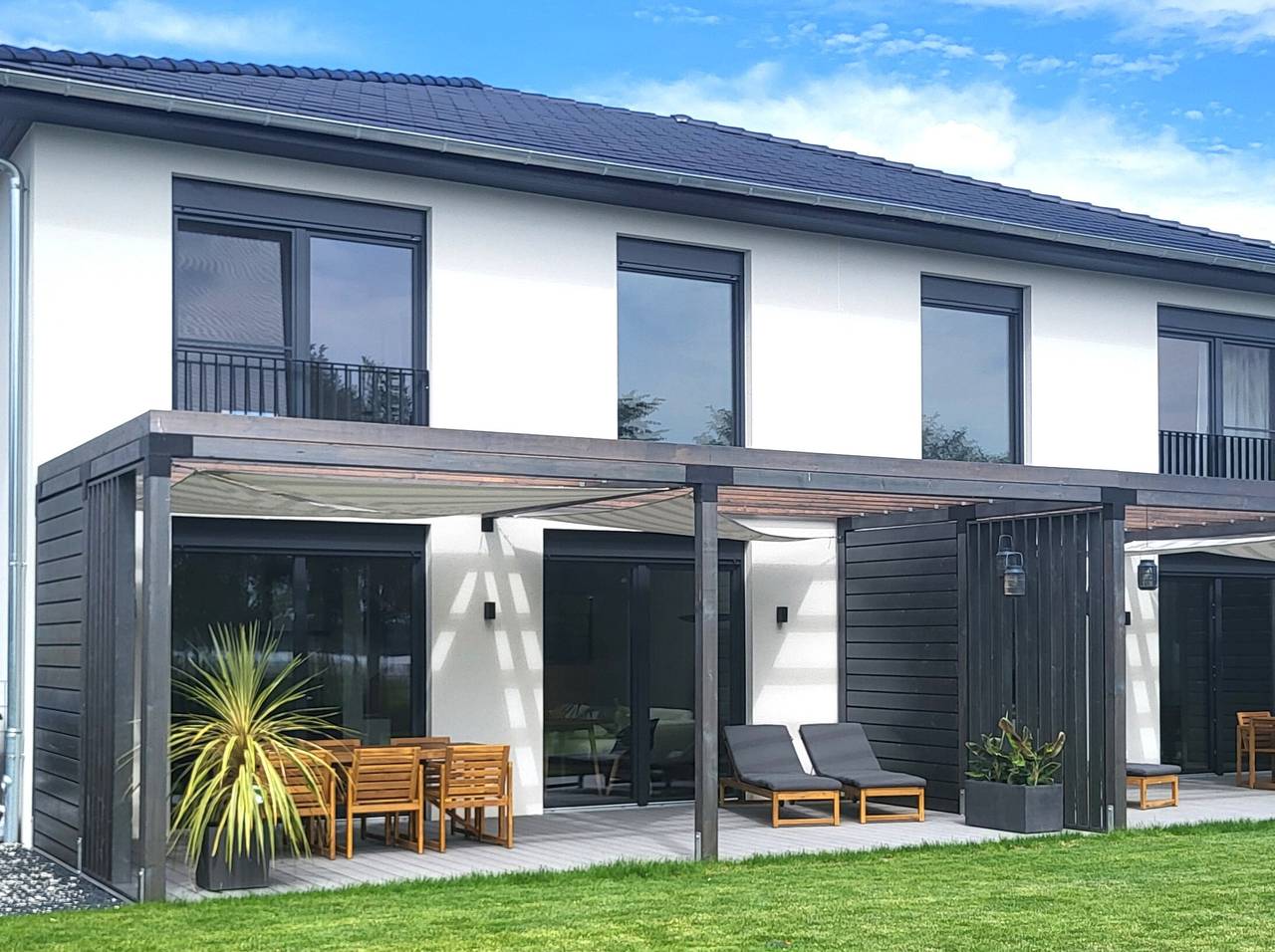 Casa vacanze 'Schlossterrassen 8b' con vista lago, terrazza privata e Wi-Fi in Pouch, Muldestausee