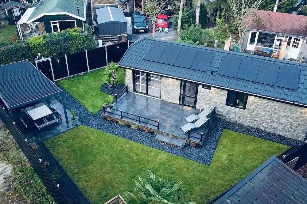 Exclusieve wellness bungalow, 6 persoons Jacuzzi! Woodland Wellness Resort in Ermelo, Veluwe