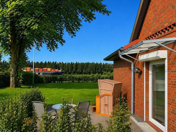 Ferienwohnung für 3 Personen, mit Terrasse und Garten sowie Sauna und Ausblick