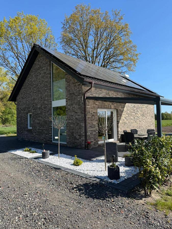Ferienwohnung für 6 Personen, mit Terrasse und Garten sowie Ausblick