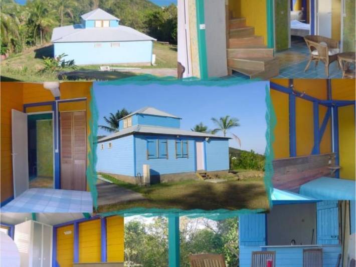 Holzbungalow, 3 Schlafzimmer, Meerblick, privater Jacuzzi in Deshaies, Guadeloupe