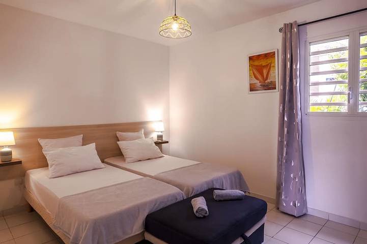 Entire apartment, \"Blue Lagoon\" the \"Dream\" becomes \"Reality\".  3 Bedrooms. Large Terrace in Anse Mitan, Les Trois-Îlets