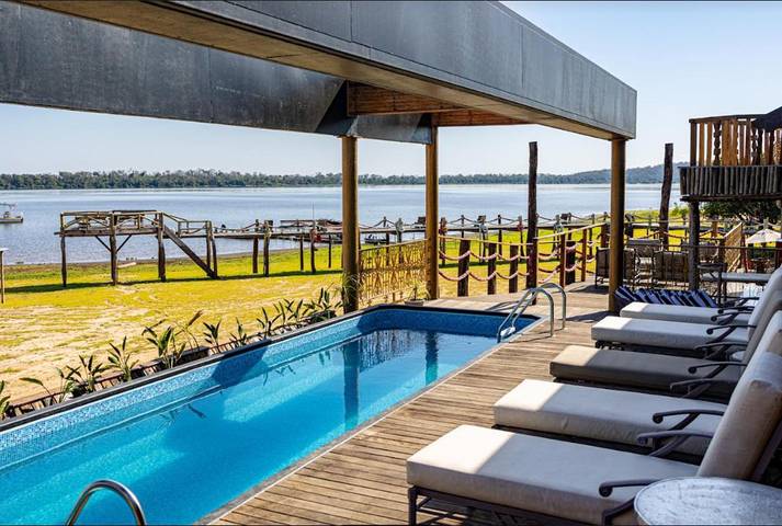 Casas e apartamentos de temporada para 4 pessoas, com vista e jardim e ainda vista para o lago and piscina, adaptado a crianças no Pantanal