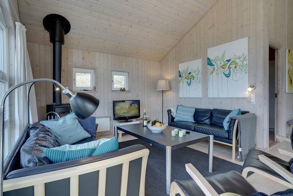 Hübsches Ferienhaus wunderschönem, leicht hügeligen Naturgrundstück in Henne, Varde