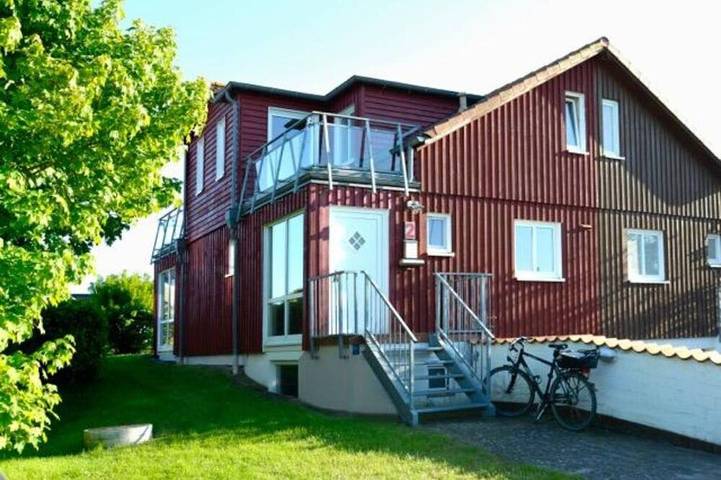 Ferienhaus für 4 Personen, mit Balkon und Garten