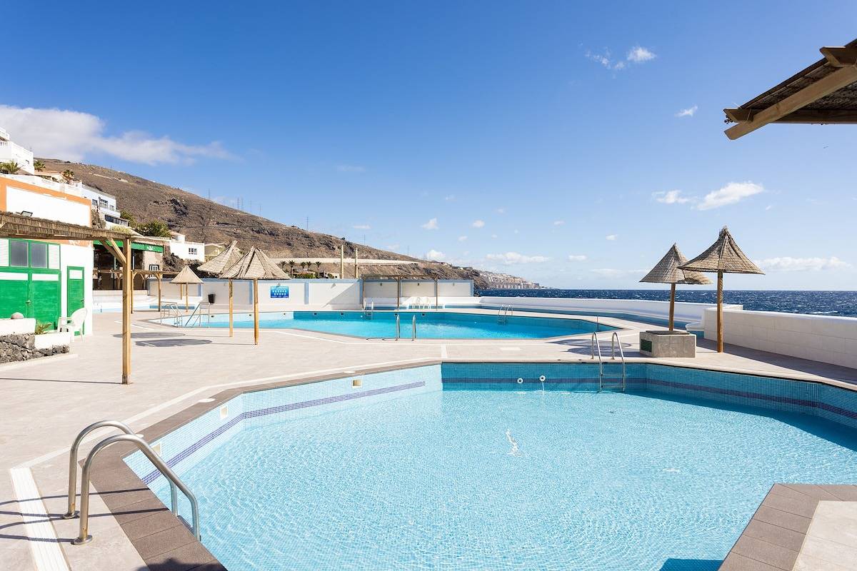 Apartamento entero, Home2Book Ocean Breeze Candelaria, Terrace & Pool in Candelaria, Tenerife Sur