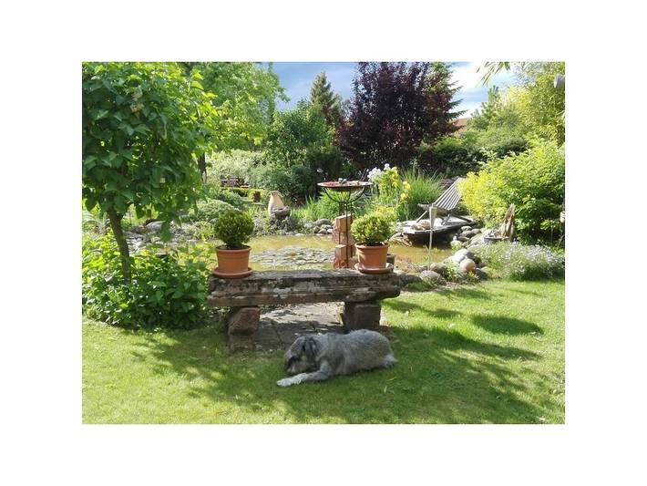 Ferienhaus für 4 Personen, mit Balkon und Garten in Landau