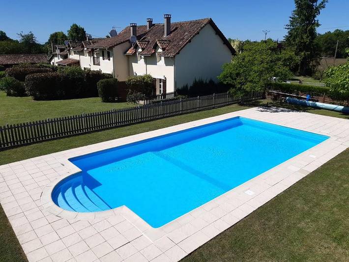 Appartement de vacances pour 4 personnes, avec Terrasse ainsi que Jardin et Piscine