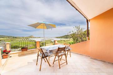 Ferienwohnung für 3 Personen, mit Balkon und Ausblick, kinderfreundlich in Chia