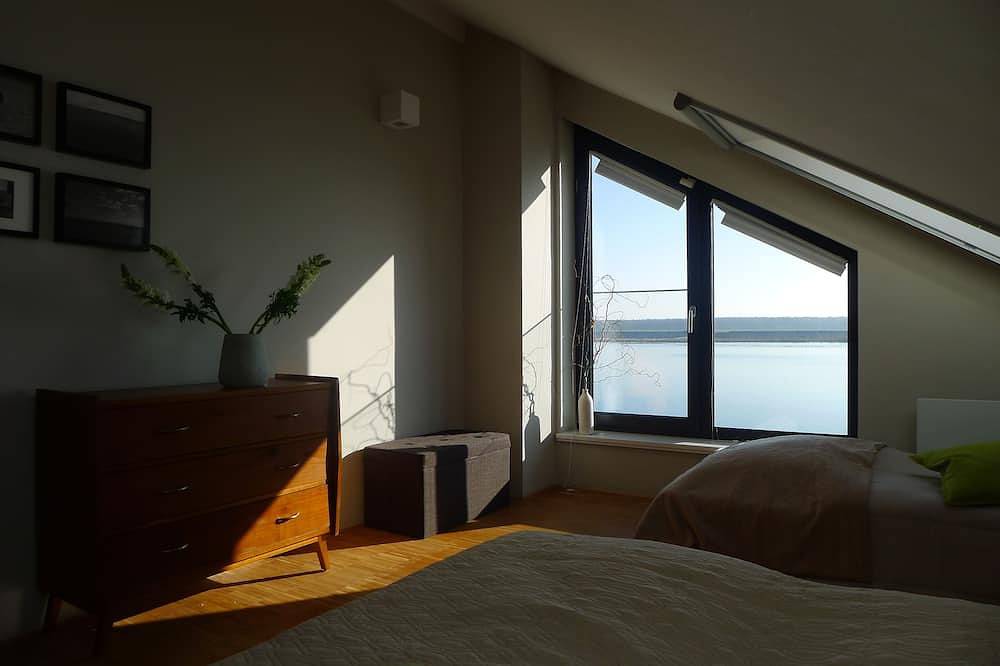 Großzügiges Ferienhaus mit Privatstrand, offenem Kamin & Sauna direkt am See in Löbnitz, Nordsachsen