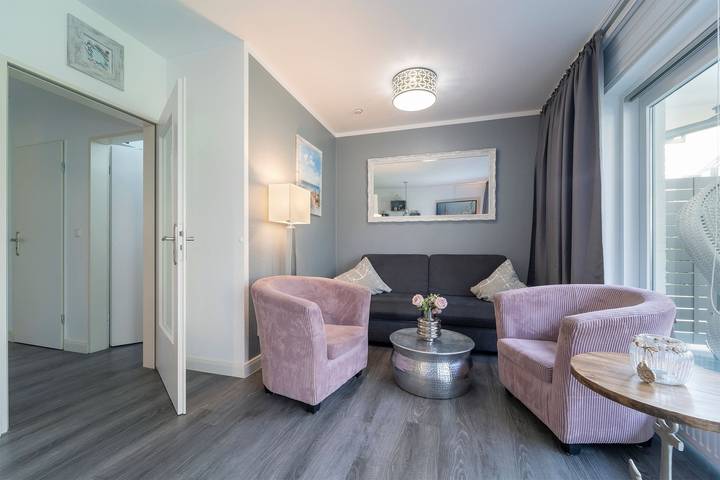 Apartamento vacacional entero, Apartamento de vacaciones para 4 personas con jardín in Scharbeutz, Distrito de Holstein Oriental