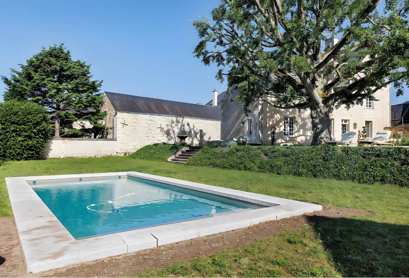 Habitación de huéspedes «Joséphine» con piscina compartida, terraza y Wi-Fi in Restigné, Valle del Loira