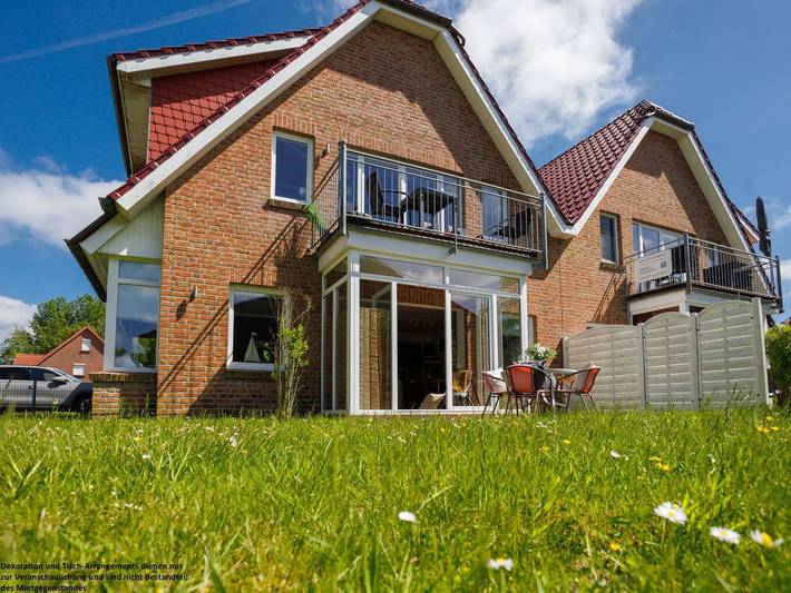 Ferienwohnung für 4 Personen, mit Terrasse und Sauna in Carolinensiel
