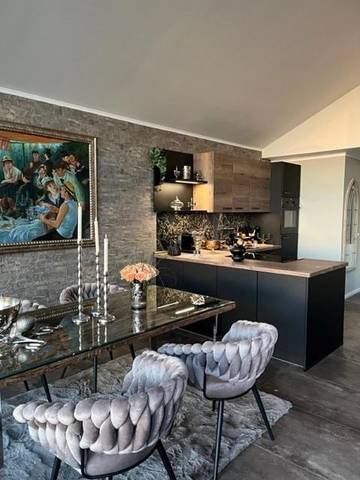 Ferienhaus für 2 Personen, mit Ausblick und Seeblick sowie Terrasse und Garten in Ammerland
