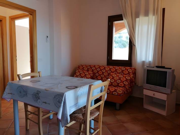 Entire apartment, Apartment 'Lu Sulianu- T2' with Private Terrace, Private Garden and Air Conditioning in Porto Ottiolu, Budoni