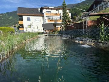 Hôtel pour 4 personnes, avec jardin et piscine ainsi que vue et sauna à Fiss