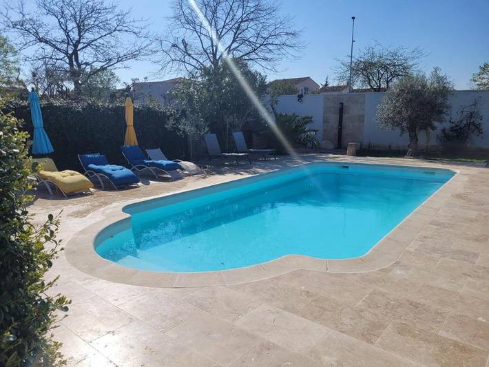Appartement de vacances pour 4 personnes, avec piscine ainsi que vue et jardin