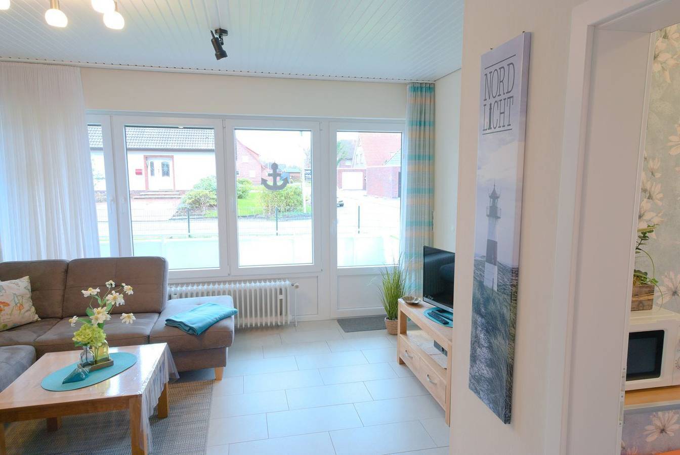 Apartamento entero, Strandnahe und gemütliche Parterre-Ferienwohnung mit Terrasse in Strand Norddeich, Norddeich