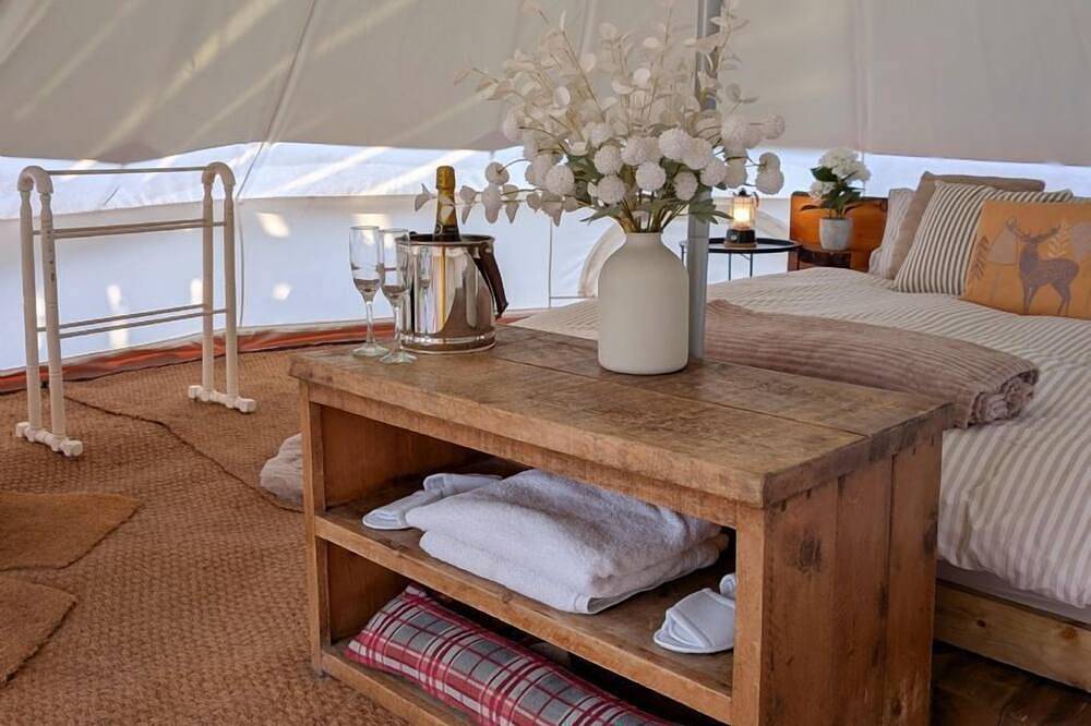 Bell tent in ultimate luxury with a wood fired hot tub, super king size bed in Stafford, Staffordshire