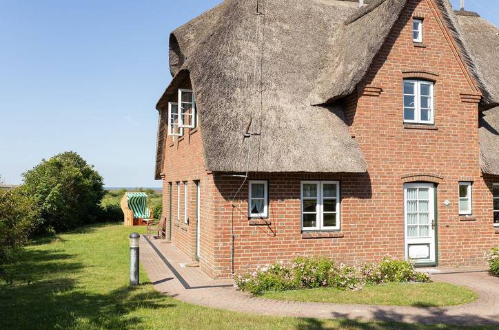 Ferienwohnung für 4 Personen, mit Terrasse und Garten sowie Ausblick in Norddorf