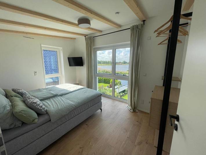 Ferienhaus mit Meerblick für 5 Personen, mit Garten und Seeblick sowie Ausblick in Ostfriesland - 4