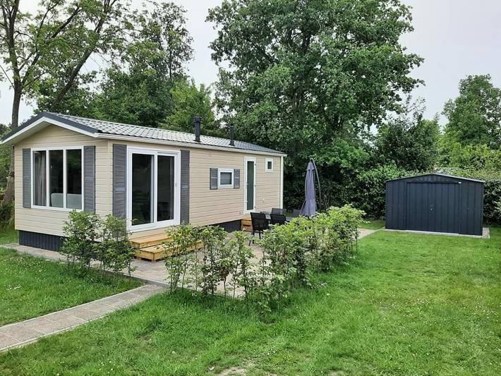 Ferienhaus für 4 Personen, mit Terrasse und Garten sowie Seeblick und Ausblick