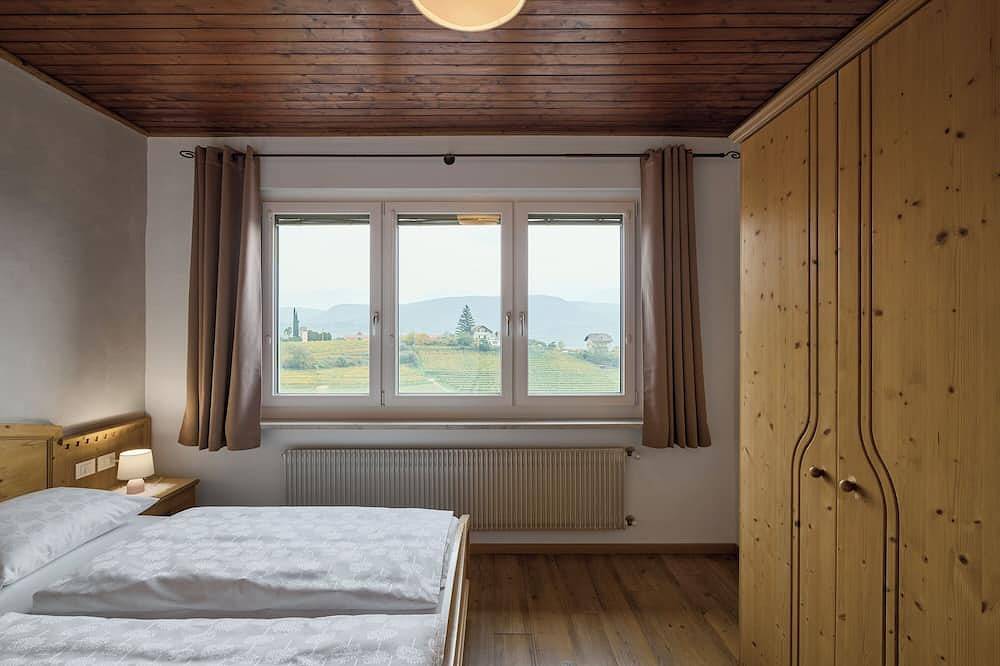 Appartamento intero, Experience South Tyrol in Kaltern, Apartment Rosengarten, balcony, central location in Lago di Caldaro, Caldaro sulla Strada del Vino