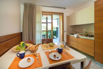 Bungalow für 3 Personen, mit Balkon und Garten in Lignano Sabbiadoro