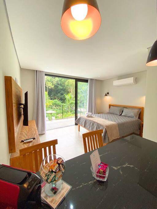 Casas e apartamentos de temporada para 2 pessoas, com piscina em Veloso (Ilhabela)