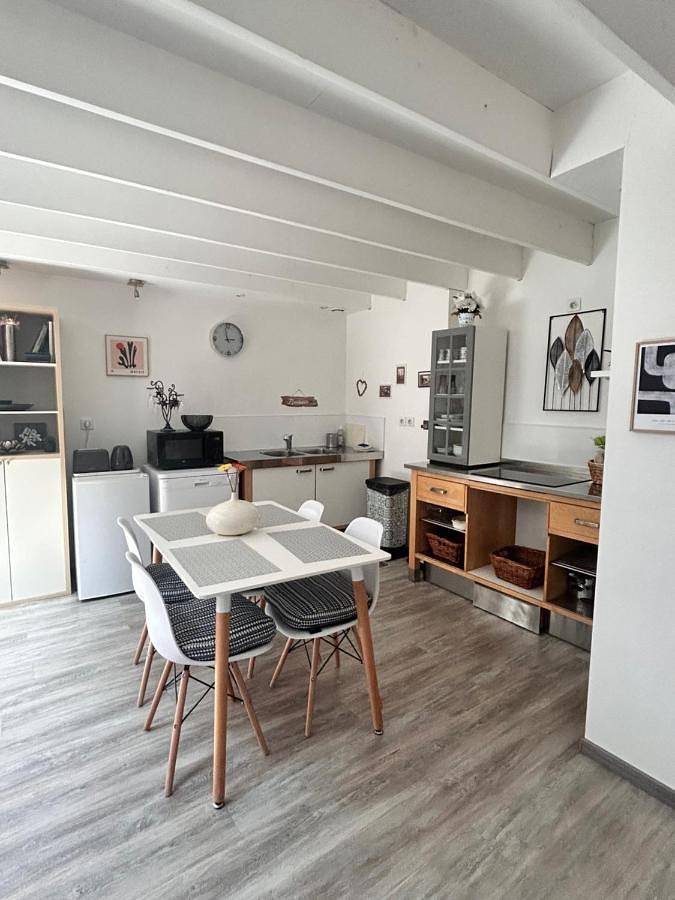 Appartement de vacances pour 4 personnes, avec Terrasse ainsi que Jardin et Piscine