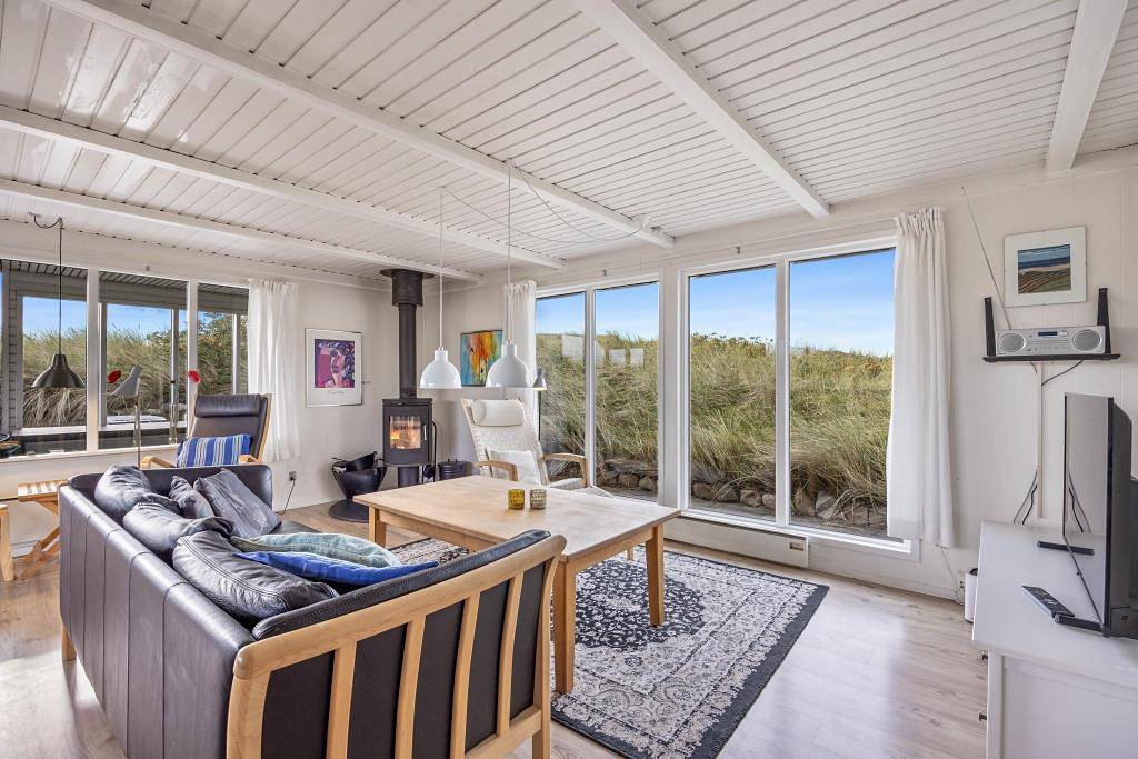 Ferienhaus mitten in den Dünen mit Panoramaaussicht in Bjerregård, Holmsland Klit
