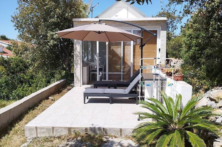 Ferienhaus für 4 Personen, mit Terrasse und Garten