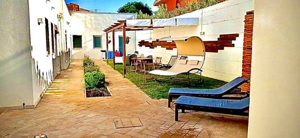 Appartamento per 3 persone, con panorama e giardino, adatto a famiglie con bambini in Ispica