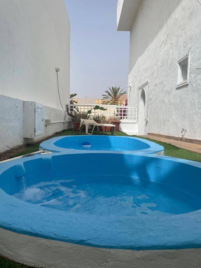 Apartamento con jardín y pequeña piscina privada para refrescarse in Maspalomas, San Bartolomé de Tirajana