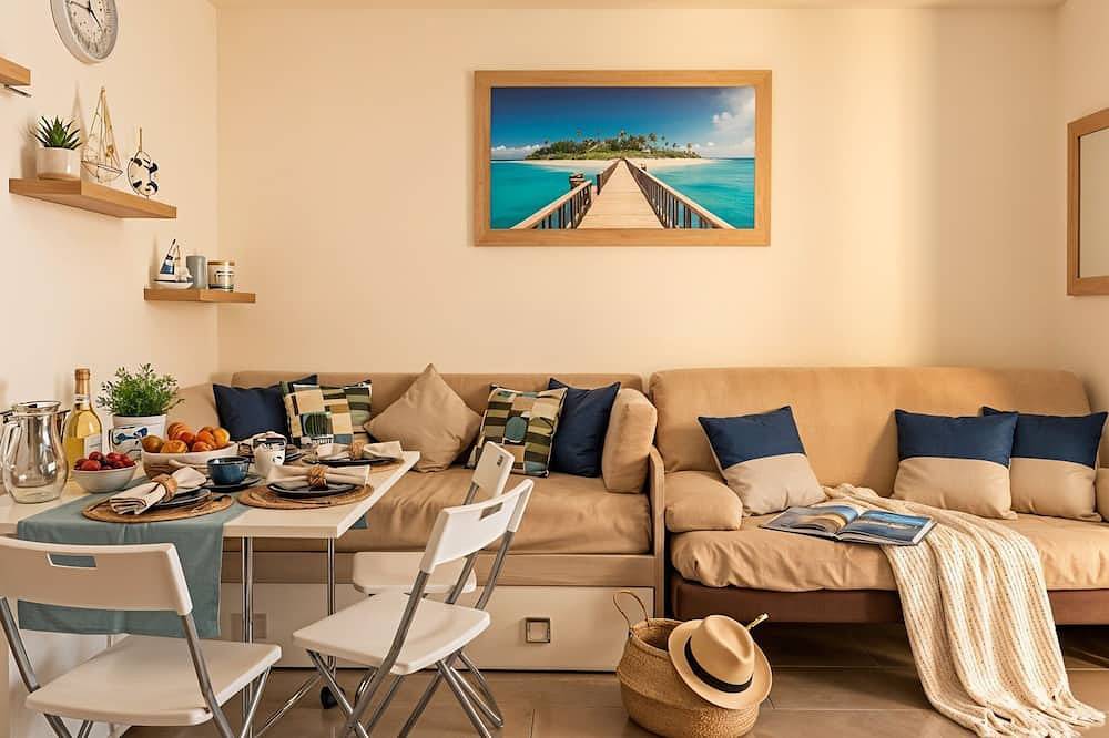 Entire apartment, Cozy Apartment with a Terrace, 2 Minutes from the Beach (Miranaxos) in Giardini-Naxos, Messina Province