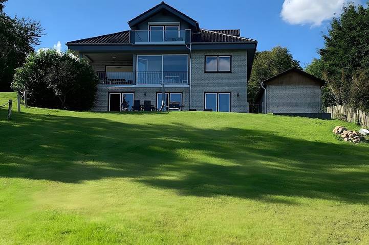 Ferienhaus für 12 Personen, mit Sauna und Balkon sowie Garten, mit Haustier in Stocksee