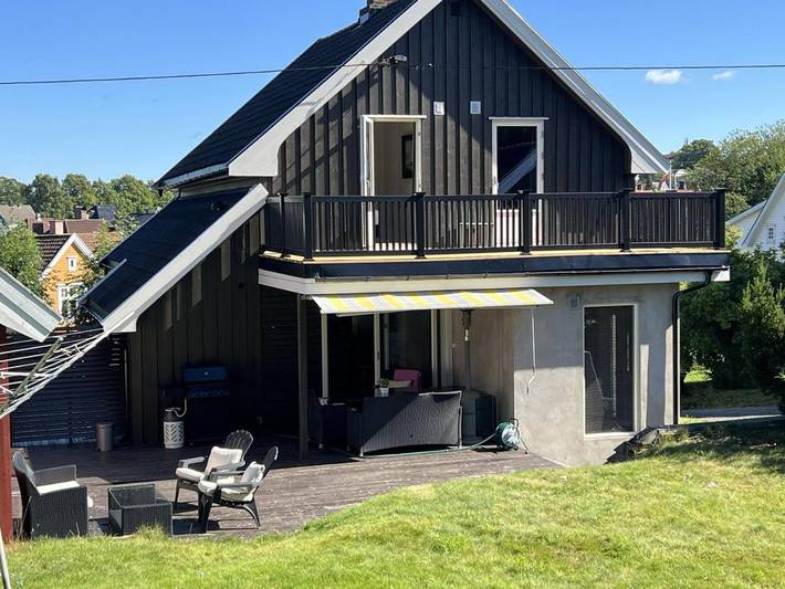 Ferienhaus für 8 Personen, mit Balkon und Terrasse sowie Garten