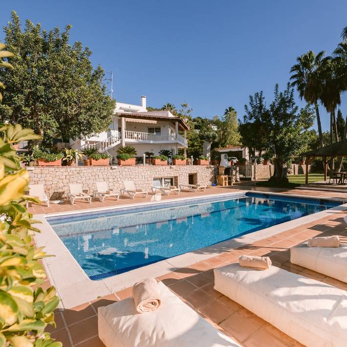 Casa de vacaciones para 12 personas, con jardín en Santa Eulària des Riu