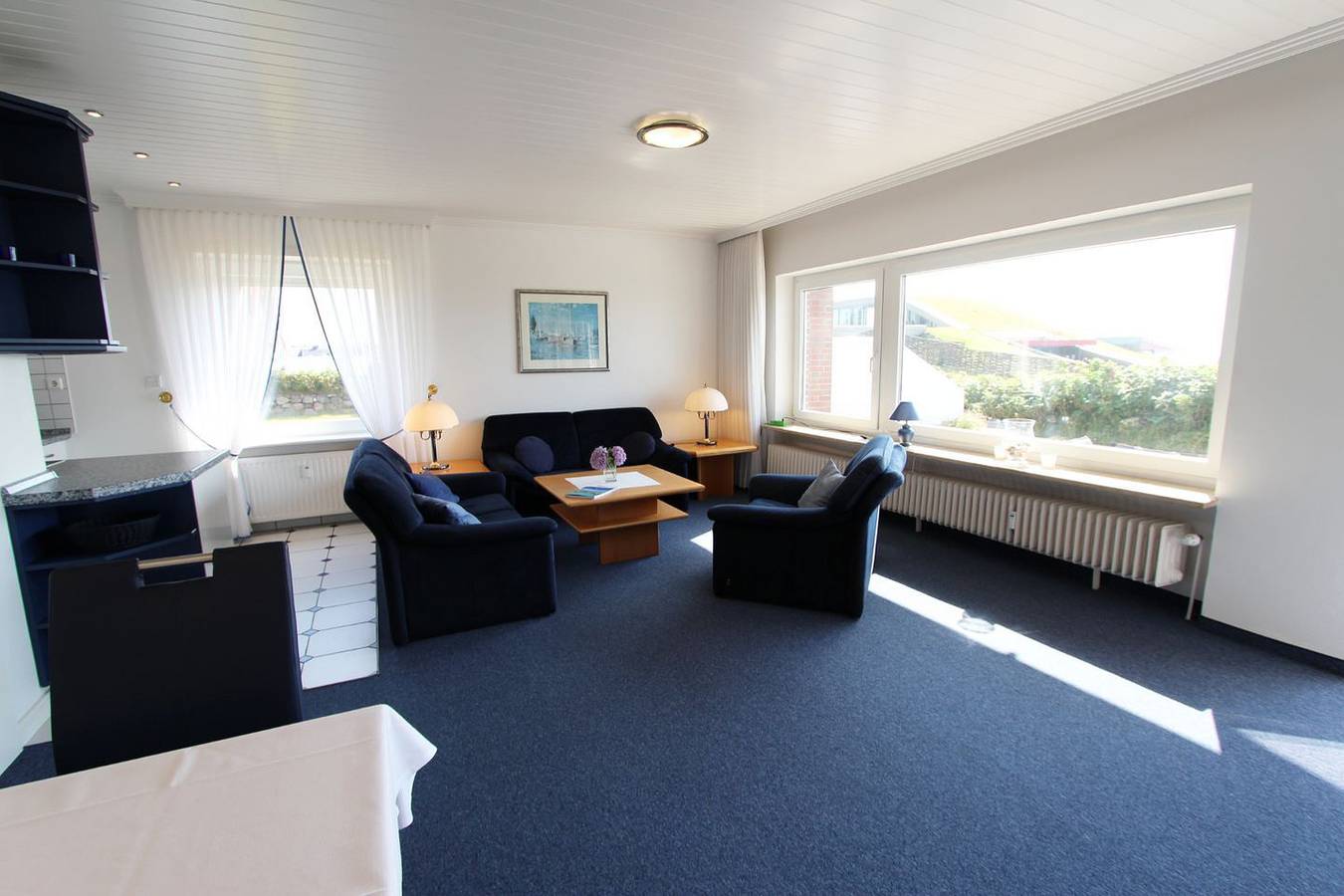 Ganze Wohnung, Helle und modern eingerichtete Ferienwohnung auf zwei Ebenen an der Promenade in Wenningstedt, Sylt