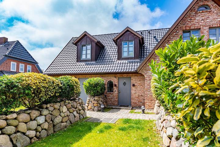 Ferienhaus für 4 Personen, mit Terrasse und Garten sowie Sauna