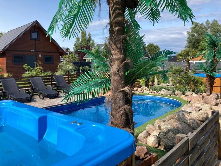 Ferienhaus für 5 Personen, mit Balkon und Terrasse sowie Whirlpool und Garten