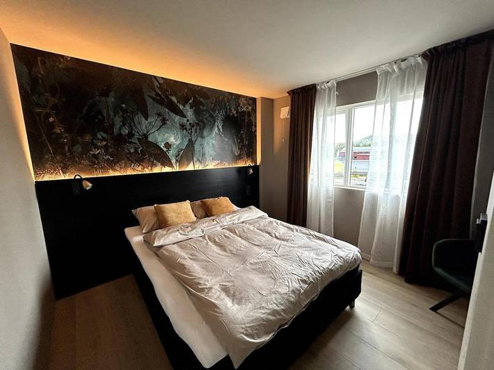 Ferienwohnung für 5 Personen, mit Ausblick und Garten in Os